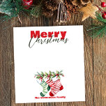 Bloc-note Festive Noël rayé bas avec verdure<br><div class="desc">Entrez dans l'esprit de vacances avec ce bloc-notes de Noël personnalisable! Doté de "Joyeux Noël" en rouge gras et vert cursif, et de trois charmants bas ornés de saints, il est parfait pour des notes festives, des listes de choses à faire et des idées cadeaux. Personnalisez-le avec votre nom de...</div>