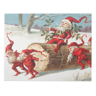 Bloc-note Gnomes dragging a cut tree trunk through the snow