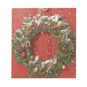 Bloc-note Guirlande de Noël accrochant sur une porte