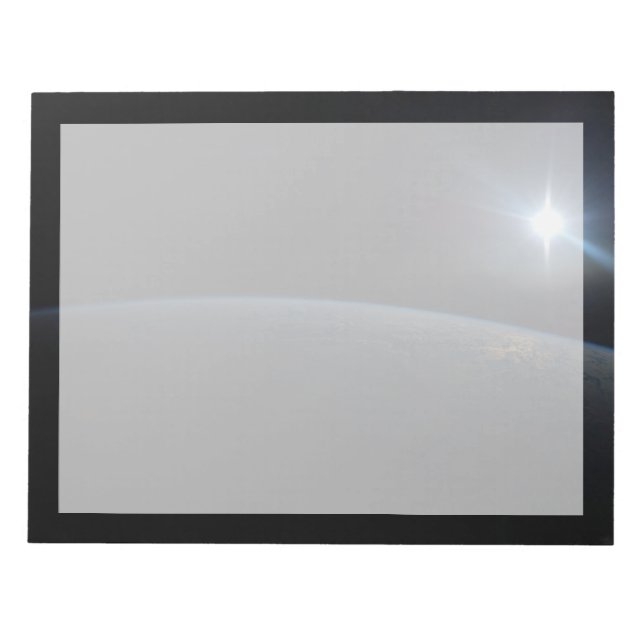 Bloc-note Le Soleil qui s'installe sur l'horizon terrestre. (Devant)