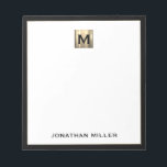 Bloc-note Monogramme d'or personnalisé noir blanc<br><div class="desc">Élevez votre jeu de papeterie avec ce bloc-notes monogrammé avec typographie classique et un monogramme médaillon d'or brossé et garniture noire. Le bloc-notes comprend de l'espace pour votre nom ou votre texte personnalisé, ce qui le rend parfait pour un usage personnel ou professionnel. Utilisez-le pour noter les notes, les idées...</div>