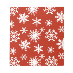 Bloc-note Snowflakes en blanc sur arrière - plan rouge