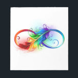 Bloc-note Symbole d'infini avec plume arc-en-ciel<br><div class="desc">Symbole artistique à l'infini avec belle plume arc-en-ciel sur arrière - plan blanc. Style tatouage.</div>