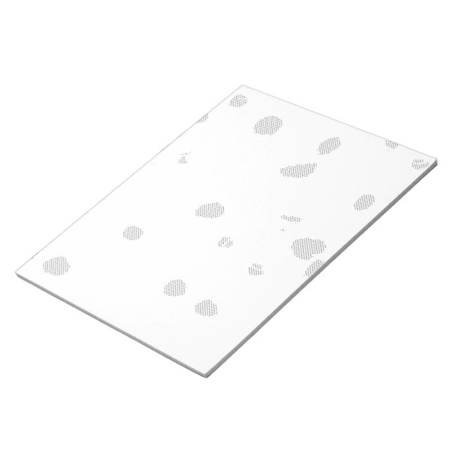 Bloc-note un arrière - plan blanc avec beaucoup de petits po (Incliné)