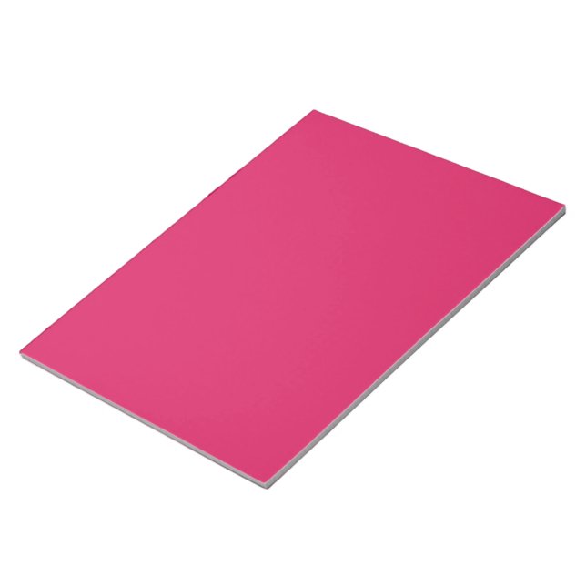 Bloc-note un arrière - plan rose avec une bordure blanche (Incliné)
