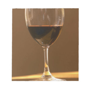 Bloc-note Un verre de Belgrave rouge au soleil.
