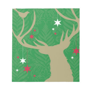 Bloc-note Une silhouette d'un cerf aux étoiles suspendues à