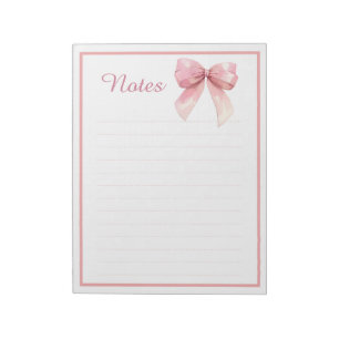 Bloc-notes à lignes avec un nœud ruban rose mignon