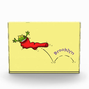 Bloc Photo Cute grenouille dans une chaussette rouge saut de