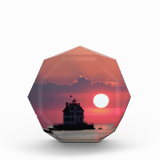 Bloc photo du coucher du soleil du phare