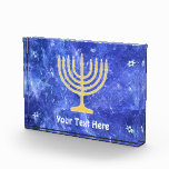 Bloc Photo Hanoukka Snowstorm Menorah<br><div class="desc">Une menorah Hanoukka dorée superposée sur une image fractale bleue et blanche qui rappelle les flocons de neige dans une tempête. Ajoutez votre propre texte. Chag Sameach !</div>