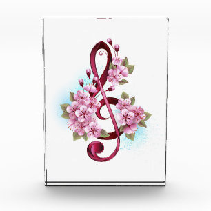 Bloc Photo Musical treble clef notes with sakura flowers