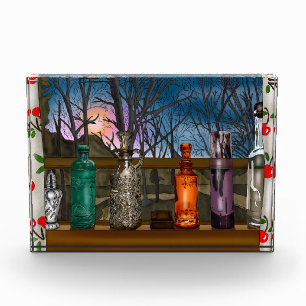 Bloc Photo Réflexion Vases en verre coloré dans la fenêtre