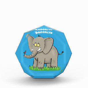 Bloc Photo Un joli éléphant drôle avec un oiseau sur le tronc