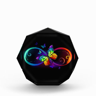 Bloc Photo Vibrant infinity with rainbow butterfly on black