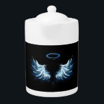 Blue Glowing Angel Wings on black background<br><div class="desc">Light,  artistique,  blue angel wings on a black background. Angel wings.</div>