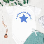 Body A STAR IS BORN | Fun Quote Blue Star Baby Bodysuit<br><div class="desc">Fun and trendy Baby Tutu Bodysuit with a big navy blue star, with A STAR IS BORN slogan. A cute tshirt for a newborn baby girl, f.i. as a baby shower gift! Easy to customize in Zazzle with your own text for a personalized design. All text style, colors, sizes can...</div>