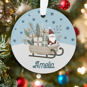 Boho Père Noël sur la seligh avec des cadeaux Snow