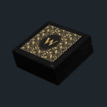 Boîte À Souvenirs Elégant Motif de luxe Black Gold Leaf<br><div class="desc">Donnez à votre être aimé une touche de classe avec cette élégante feuille d'or et monogramme noir. Ce produit est doté d'un joli motif en feuille d'or à l'allure vintage. Personnalisez avec la lettre monogramme de votre choix. C'est une boîte cadeau parfaite pour mettre vos souvenirs précieux.</div>