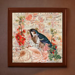 Boîte À Souvenirs Ephémère musicale vintage Orange Blue Floral Bird<br><div class="desc">Ce design présente une éphémère vintage - ou des éléments qui capturent un moment de passage dans le temps - d'un oiseau-chanteur bleu foncé aux fleurs orange, rousses et crème, contre un arrière - plan de partition musicale. Ce collage est un rappel coloré de profiter de beaux objets et de...</div>
