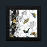Boîte À Souvenirs Oiseaux et papillons sur un Arrière - plan noir et<br><div class="desc">L'artiste Chariklia Zarris est un peintre et designer talentueux. Elle aime peindre des oiseaux et des animaux sauvages et cette photo ne fait pas exception. Les couleurs vives des oiseaux et des papillons sont accentuées par les branches noires et blanches de l'arrière - plan.</div>