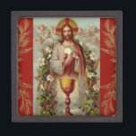 Boîte À Souvenirs Première Communion Jésus Fleurs eucharistes<br><div class="desc">Vous aimerez donner ce beau souvenir à un First Communications spécial. Il s'agit d'une image catholique traditionnelle de Jésus tenant l'Hôte alors qu'il est entouré d'anges et de fleurs. Le calice d'or est devant Lui. Les branches de feuilles d'or apportent une touche d'élégance supplémentaire. Ce serait un endroit idéal pour...</div>