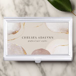 Boîtier Pour Cartes De Visite Aquarelle Abstraite brillant Luxe Elegant Or<br><div class="desc">Abstrait Aquarelle brillant Luxe Elegant Boîtier de carte d'affaires Or. Ce design présente des formes d'aquarelle abstraites avec de l'or brillant et des accents d'or rose qui semblent plus brillants. Parfait pour une femme d'affaires à la recherche de coiffeurs,  maquilleur,  cosmétologiste,  et plus !</div>