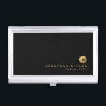 Boîtier Pour Cartes De Visite Monogramme minimal en or brossé noir<br><div class="desc">Conception monographique minimaliste avec typographie de bloc classique médaillon de monogramme métal brossé or avec nom et titre personnalisés ou texte personnalisé ci-dessous sur un simple arrière - plan noir. Personnalisez pour votre usage personnalisé.</div>