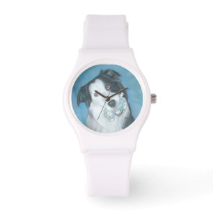 border collie noir et blanc mignon avec la montre