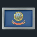 Boucle de ceinture avec drapeau de l'État de l'Ida<br><div class="desc">Ajoutez une touche vibrante d'esprit Idaho à votre tenue avec notre boucle à ceinture exclusive avec le drapeau d'Idaho! Réalisée avec une attention minutieuse aux détails, cette boucle de ceinture est plus qu'fonctionnelle, c'est une célébration du patrimoine de l'Idaho et de la fierté de l'Etat. Le design audacieux présente fièrement...</div>