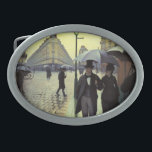 Boucle De Ceinture Ovale Journée de la Pluie de Paris par Gustave Caillebot<br><div class="desc">Paris Street, Rainy Day (alias Paris : A Rainy Day) (1877) de Gustave Caillebotte est un impressionnisme vintage de beaux-arts peinture urbaine. Un carrefour pavé près de la Gare Saint-Lazare, une gare du nord de Paris, France. Les gens marchent sous la pluie tenant des parapluies dans la ville. À propos...</div>