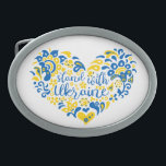 Boucle De Ceinture Ovale Soyez avec l'Ukraine lettrage et coeur<br><div class="desc">Stand with Ukraine lettering and heart in Ukrainian flag color and transparent ethnico-motif Folk art illustration heart and lett in Ukrainian flag color and ethnical motif heart, shape, Pureté, Allégorie, signe de paix, symbole de paix, paix, pas de guerre, arrêter la guerre, anti-guerre, Ukraine, ukrainien, ethnico-motif, drapeau ukrainien, bleu et...</div>