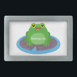 Boucle De Ceinture Rectangulaire Caricature de grenouille verte mignonne<br><div class="desc">Cette mignonne grenouille verte et joyeuse assise sur un coussin de lys violet est lumineuse et adorable. Beaucoup d'amusement amphibien dessiné dans un joyeux style de dessin animé.</div>