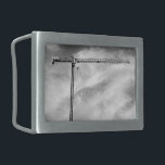 Boucle De Ceinture Rectangulaire Grue de construction et ciel photo noir et blanc<br><div class="desc">Bien au-dessus d'un bâtiment, une grue de construction attend sa prochaine tâche. La grue ressemble à un T à flanc, son bras noir étroit s'étirant à droite de la photo. Une gamme de supports triangulaires à l'aspect délicat mais trompeuse forme l'intérieur de la grue comme le pont que j'ai construit...</div>