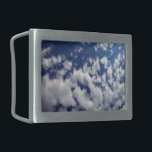 Boucle De Ceinture Rectangulaire Nuages Puffy Sur Ciel Bleu<br><div class="desc">Un banc de nuages blancs bouffants se brise en petits morceaux qui traversent le cadre de la photo verticale. La couverture nuageuse est plus dense à gauche et plus clairsemée à droite, révélant un ciel bleu profond qui est foncé près du sommet de la photo et plus léger près du...</div>