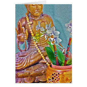 Bouddha aux orchidées blanches