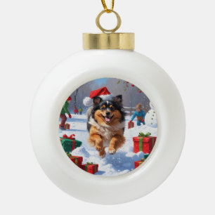 Boule En Céramique Chien Keeshond courant dans la neige avec un chape