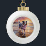 Boule En Céramique Sandy Australian Shepherd Dog on Beach Sunset<br><div class="desc">Plongez dans la beauté tranquille de notre chien "Sandy Paws and Sunset Hues" sur le coucher du soleil de plage. Cette scène captivante saisit l'essence d'une soirée parfaite au bord de l'eau, avec un fidèle compagnon canin qui profite du sable doré et des teintes époustouflantes du soleil couchant. Que vous...</div>