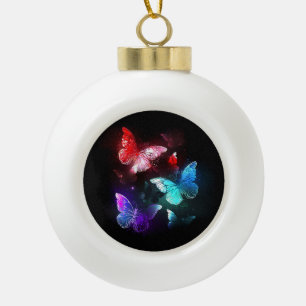 Boule En Céramique Trois papillons brillants sur l'arrière - plan de