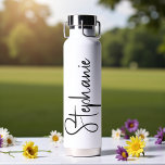 Bouteille D'eau Elegant Calligraphy Script Personalized Name<br><div class="desc">Elegant Calligraphy Script Personalized Name Water Bottle features your custom name in elegant calligraphy script. Perfect as personalized gifts for family and friends for Christmas and birthdays or as favors for weddings and events. Add a personalized touch to custom corporate gifts and more. Designed by ©2025 Evco Studio www.zazzle.com/store/evcostudio</div>