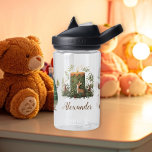 Bouteille D'eau Noël personnalisé Whimsical Baby 1er Christma<br><div class="desc">Célébrez le premier Noël de votre bébé avec la Bouteille d’eau de Noël Whimsical Baby 1st personnalisée. Il ne s’agit pas seulement d’une bouteille d’eau, mais d’un gardien personnalisé qui commémore cette étape importante de la vie de votre bébé. Customisez-le avec le nom de votre bébé pour créer un ajout...</div>