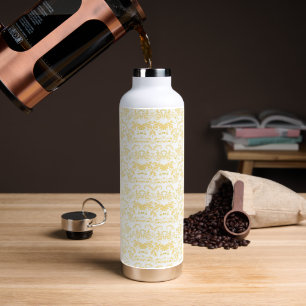 Bouteille D'eau papier peint blanc et or avec un motif