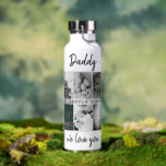 Bouteille D'eau Père avec enfants et famille papa 6 Photo Collage<br><div class="desc">Père avec Enfants et Famille Papa 6 Photo Bouteille d'eau Collage. Collage de 6 photos, le nom du père avec un message doux dans un script noir tendance et les noms des enfants qui superposent les photos. Ajoutez vos 6 photos de famille préférées. Bon sang et un cadeau pour l'anniversaire,...</div>