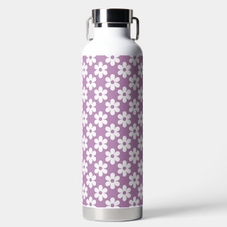 BOUTEILLE D'EAU VIOLET AVEC FLEURS DE DAISY BLANCHES
