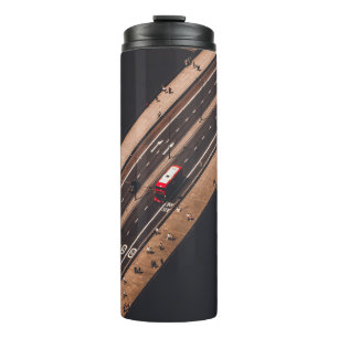 BOUTEILLES ISOTHERMES BUS ROUGE ET BLANC FONCTIONNANT SUR LE PONT