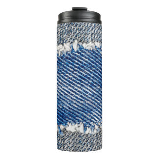 Bouteilles Isothermes Cadre Denim. Tissu en denim déchiré avec bord de f