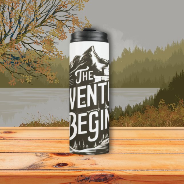 Bouteilles Isothermes Le gobelet isolant "L'Aventure Commence" - Voyage  (Fuel your journey, from the daily commute to the mountain trail. This "The Adventure Begins" thermal)
