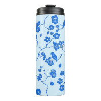 Oiseaux en fleurs de cerisier bleu sur bleu