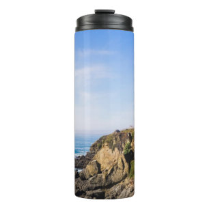 Bouteilles Isothermes Phare sur colline ciel bleu maison blanche océan
