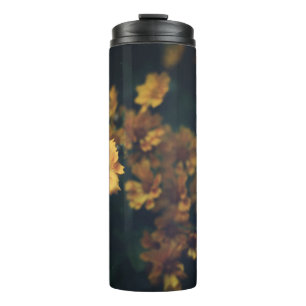 BOUTEILLES ISOTHERMES PHOTOGRAPHIE DE BOKEH DES FLEURS JAUNES